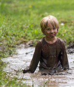 boy in mud